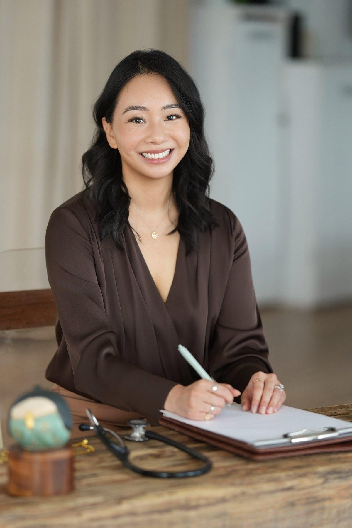 Dr. Mary Sun at her desk